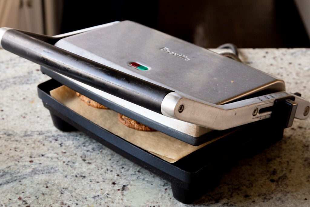 panini press, closed, with cookies inside