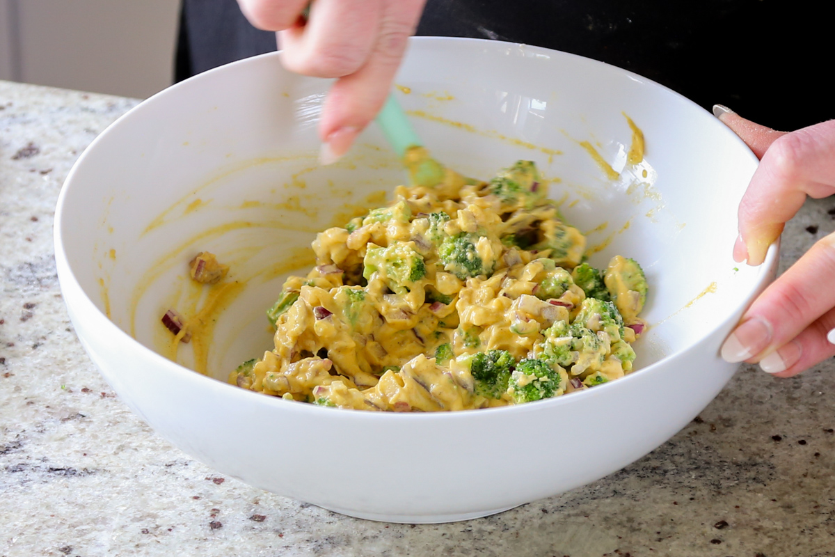 mixing the veggies into the pakora batter