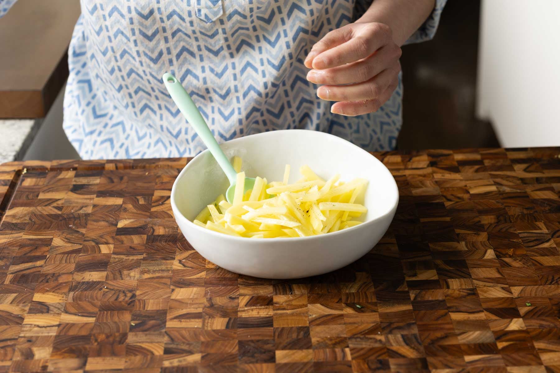 salting the potatoes