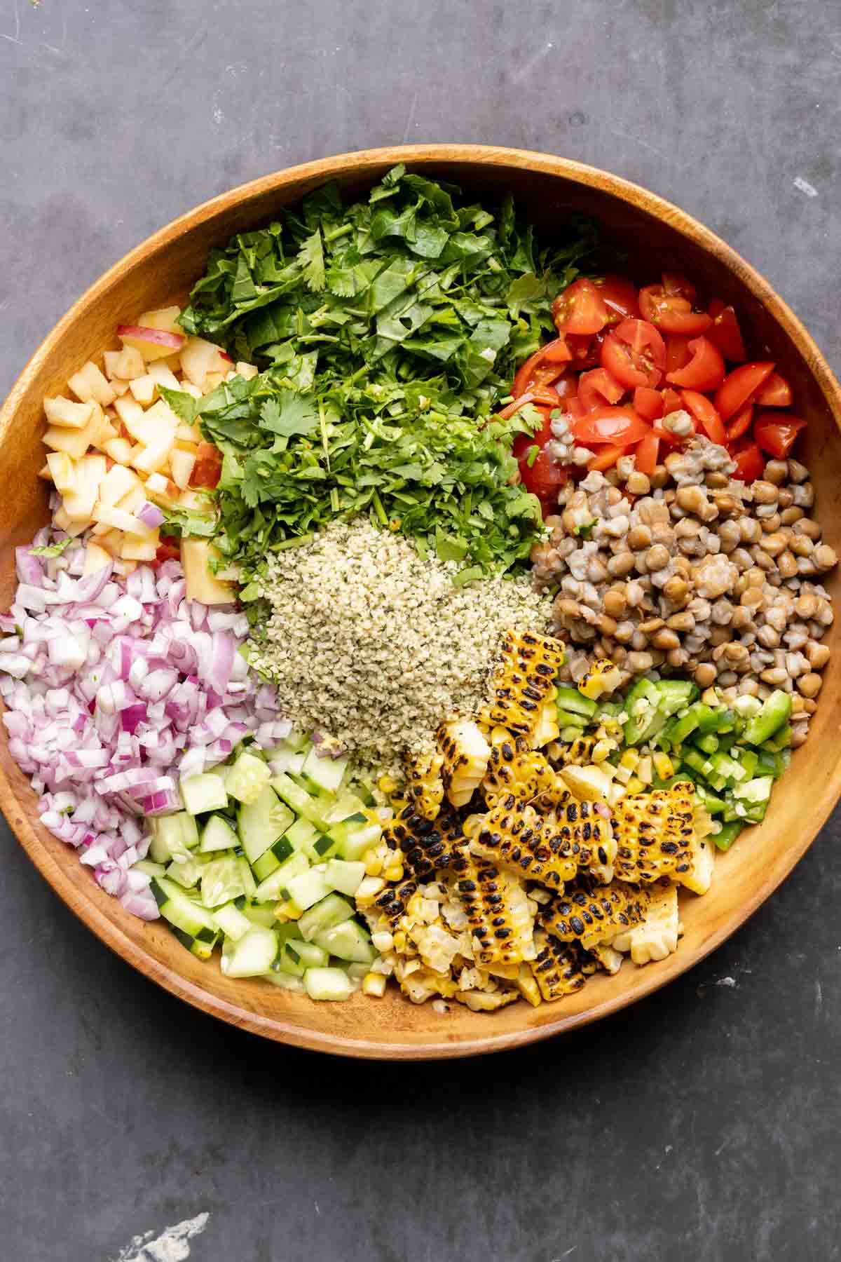 lentil dip ingredients in a bowl before adding the dressing